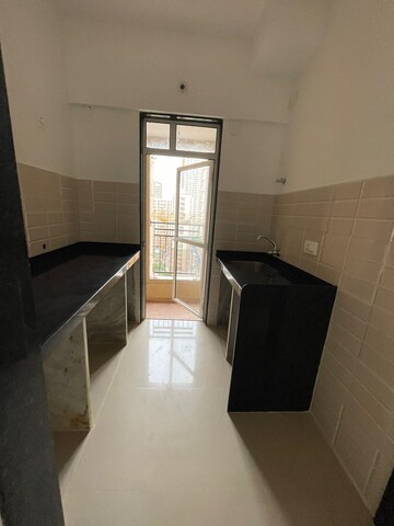 Kitchen in 1 BHK Apartment at JP North Alexa, Mira Road – for Sale