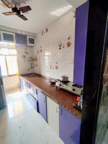 Kitchen in 2 BHK Apartment at Laxmi Dhule Complex, Nalasopara East – for Sale