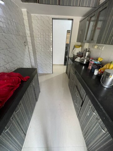 Kitchen in 2 BHK Apartment at Evershine Woods, Mira Road – for Rent