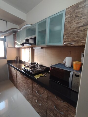 Kitchen in 2.5 BHK Apartment at Lodha Splendora Tierra, Ghodbunder Road – for Sale