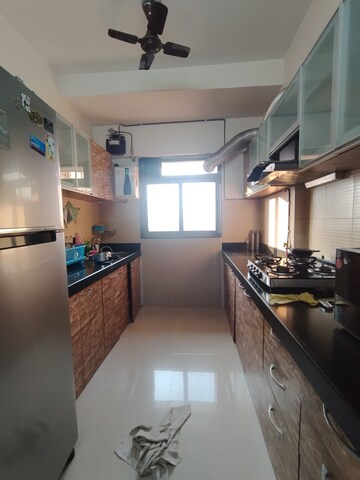 Kitchen in 2.5 BHK Apartment at Lodha Splendora Tierra, Ghodbunder Road – for Sale