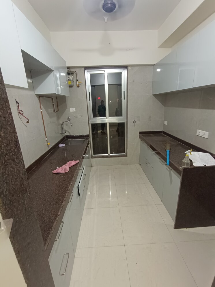 Kitchen, goodwill-unity 2 Bedroom 1200 Sq.Ft. Apartment In Sanpada Navi Mumbai 8102136