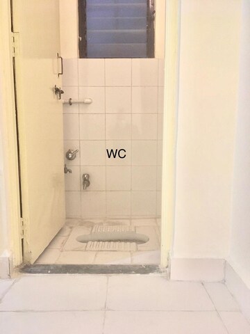 Bathroom in 2 BHK Apartment at Karan Ceto, Wadgaon Sheri – for Rent