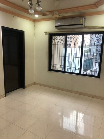 Room in 1 BHK Apartment at New Nandanvan CHS Brahmand, Brahmand – for Sale