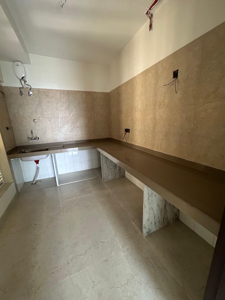Kitchen, dosti-west-county-phase-4-dosti-pine 2 Bedroom 735 Sq.Ft. Apartment In Balkum Pada Thane 8102322
