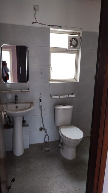 Bathroom in 3 BHK Builder Floor at Puri Aman Vilas, Sector 89 – for Rent