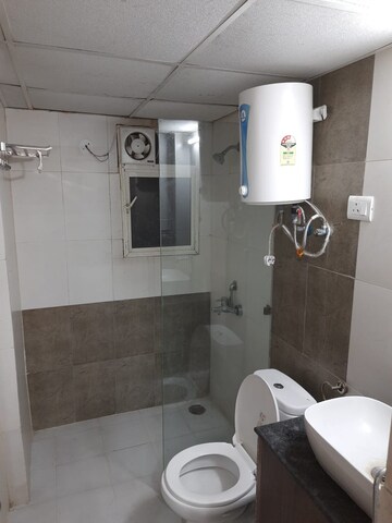 Bathroom in 3 BHK Apartment at Antriksh Golf View, Sector 78 – for Rent