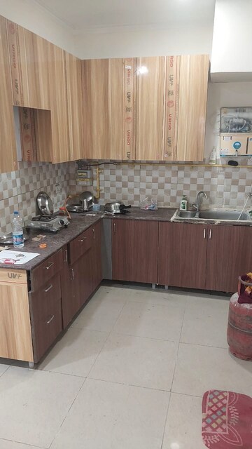 Kitchen in 2.5 BHK Apartment at Gaur City 2 - 10th Avenue, Sector 16c Greater Noida – for Rent