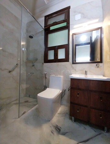Bathroom in 4 BHK Builder Floor at RWA Apartments, Sector 31 – for Rent