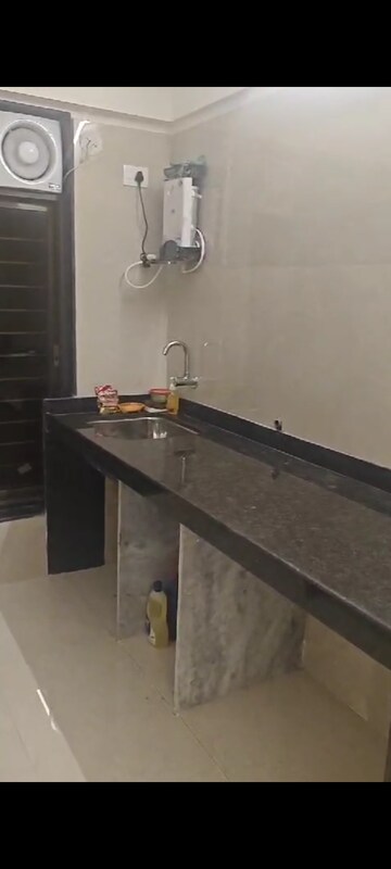 Kitchen in 2 BHK Apartment at Adityaraj Breeze, Vikhroli East – for Rent
