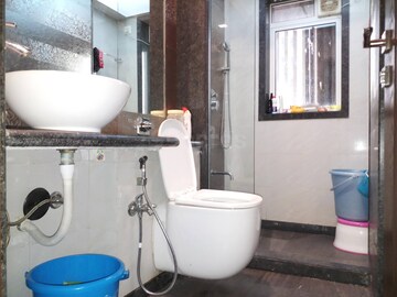Bathroom in 1 BHK Apartment at Je And Vee Om Trimurti, Malad East – for Rent