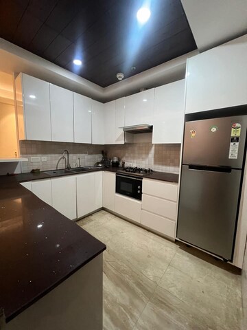 Kitchen in 3 BHK Apartment at Supertech Supernova Nova Residences, Sector 94 – for Rent
