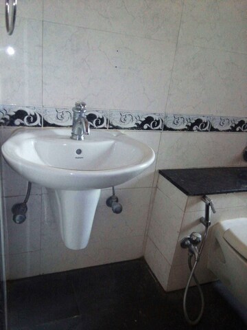 Bathroom in 2 BHK Apartment at K Raheja Heights, Malad East – for Rent