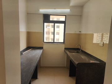 Kitchen in 1 BHK Apartment at Lodha Palava City Lakeshore Greens, Dombivli East – for Rent