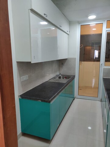 Kitchen in 3 BHK Apartment at Mahagun Mirabella, Sector 79 – for Rent