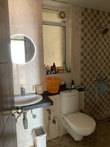 Bathroom in 3 BHK Apartment at Mahagun Mirabella, Sector 79 – for Rent