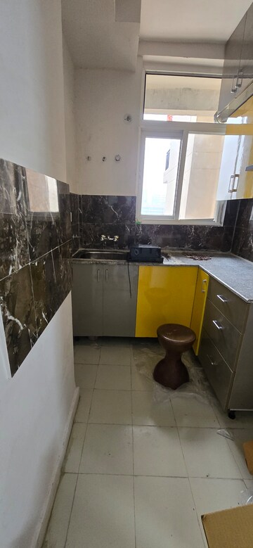 Kitchen in 2.5 BHK Apartment at Amrapali Riverview, Amrapali Leisure Valley – for Rent