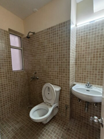 Bathroom in 4 BHK Apartment at Lotus Panache, Sector 110 – for Sale
