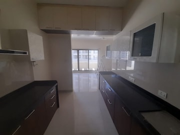Kitchen in 2 BHK Apartment at Skyi Songbirds, Bhugaon – for Sale