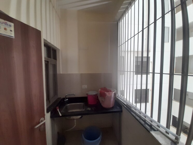 Kitchen, skyi-songbirds 2 Bedroom 825 Sq.Ft. Apartment In Bhugaon Pune 8102942