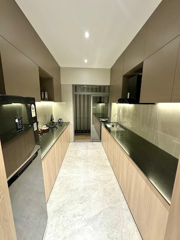 Kitchen in 3 BHK Builder Floor at Adani Airica, Kanjurmarg West – for Sale