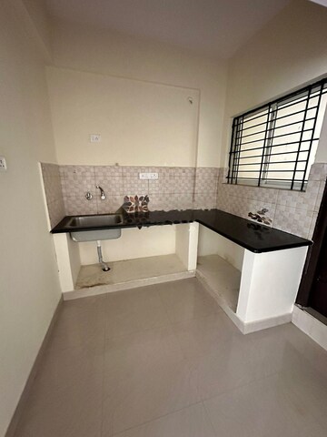 Kitchen in 3 BHK Apartment at Mn Credence Flora, Begur – for Sale
