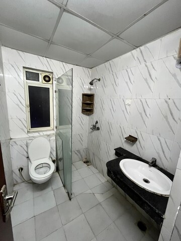 Bathroom in 2 BHK Apartment at Nimbus The Golden Palm, Sector 168 – for Rent