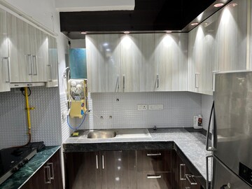 Kitchen in 2 BHK Apartment at Nimbus The Golden Palm, Sector 168 – for Rent