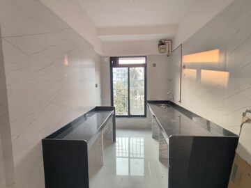 Kitchen in 2 BHK Apartment at Rawal Holy Family CHSL, Ic Colony – for Sale