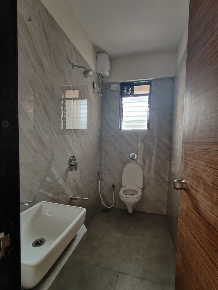Bathroom, rawal-holy-family-chsl 2 Bedroom 575 Sq.Ft. Apartment In Ic Colony Mumbai 8103234