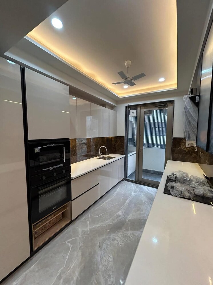 Kitchen, emaar-emerald-floors-premier 3 Bedroom 1650 Sq.Ft. Apartment In Sector 65 Gurgaon 8103281