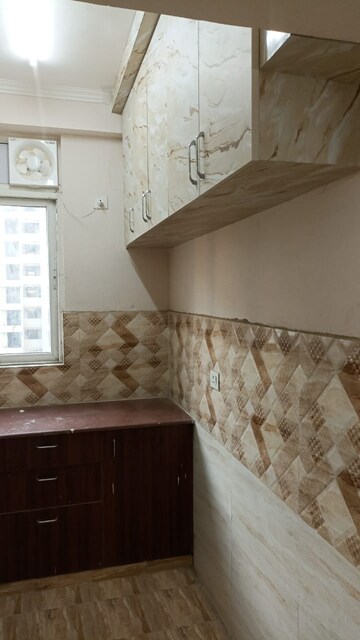Kitchen in 3 BHK Apartment at Amrapali Empire, Sain Vihar – for Rent