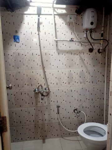 Bathroom in 2 BHK Apartment at Royal Palms Diamond Isle Phase III, Goregaon East – for Rent