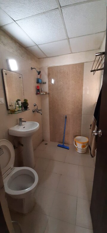Bathroom in 2 BHK Apartment at Amrapali Village ii, Nyay Khand – for Sale