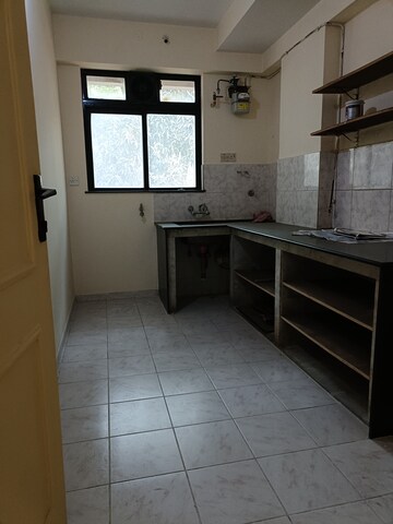 Kitchen in 1 BHK Apartment at Hiranandani Estate Oyster, Ghodbunder Road – for Sale