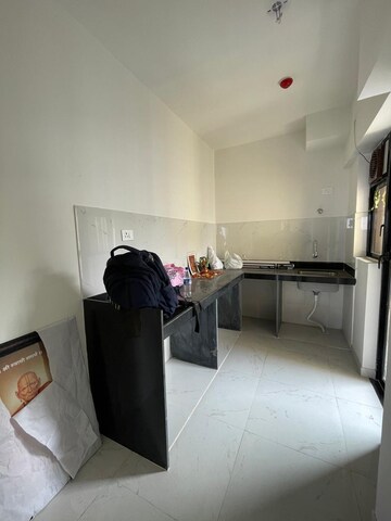 Kitchen in 2 BHK Apartment at Runwal Gardens Phase I, Dombivli East – for Rent