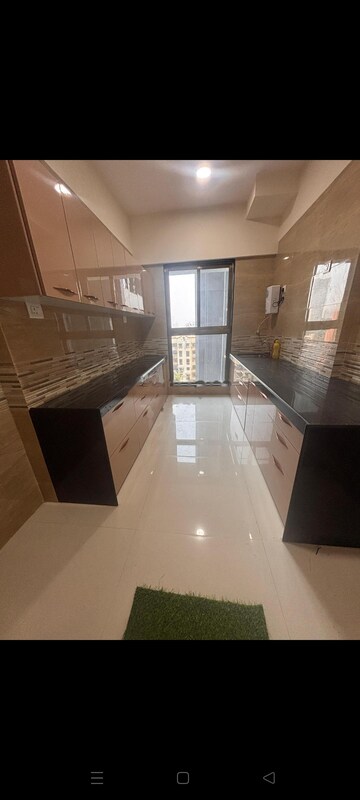 Kitchen in 2 BHK Apartment at Rajesh Raj Infinia, Malad West – for Rent