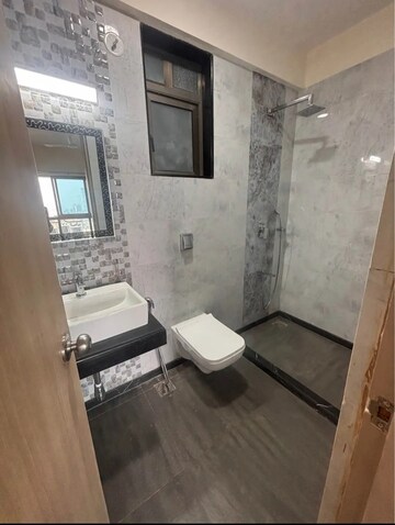 Bathroom in 2 BHK Apartment at Rajesh Raj Infinia, Malad West – for Rent