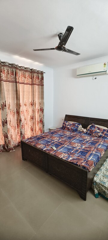 Bedroom in 2 BHK Apartment at Green Valley Heights, Dhakoli Village – for Rent