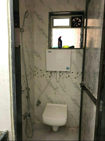 Bathroom in 1 BHK Apartment at Mangal Orchid Chs, Andheri West – for Rent