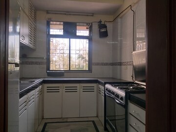 Kitchen in 3 BHK Apartment at Valencia Apartment Juhu, Juhu – for Rent