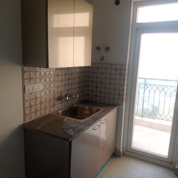 Kitchen in 3 BHK Apartment at Urbtech Xaviers, Sector 168 – for Rent