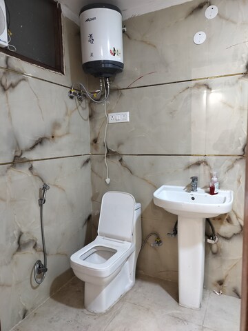 Bathroom in 3 BHK Builder Floor at Chattarpur – for Rent