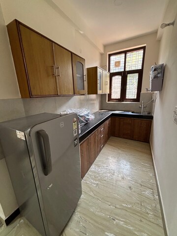 Kitchen in 2 BHK Builder Floor at Ansal Sushant Lok I, Sector 43 – for Rent