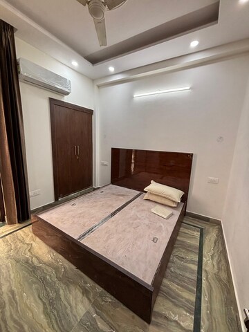 Bedroom in 2 BHK Builder Floor at Ansal Sushant Lok I, Sector 43 – for Rent
