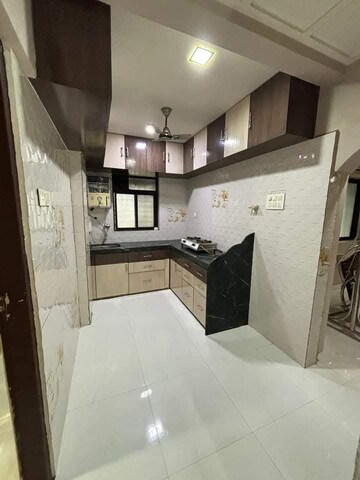 Kitchen in 1 BHK Apartment at Agarwal Residency CHS, Nalasopara East – for Rent