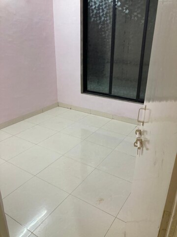 Room in 2 BHK Apartment at Seawoods – for Sale