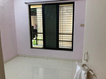 Room in 2 BHK Apartment at Seawoods – for Sale