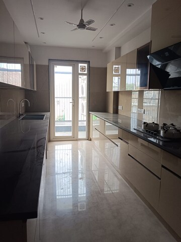 Kitchen in 4 BHK Builder Floor at Ansal Sushant Lok I, Sector 43 – for Rent