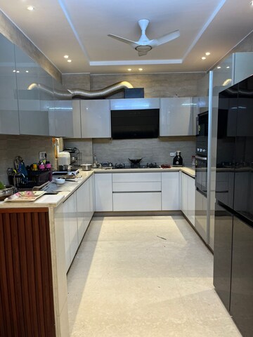 Kitchen in 4 BHK Builder Floor at Ansal Sushant Lok I, Sector 43 – for Sale